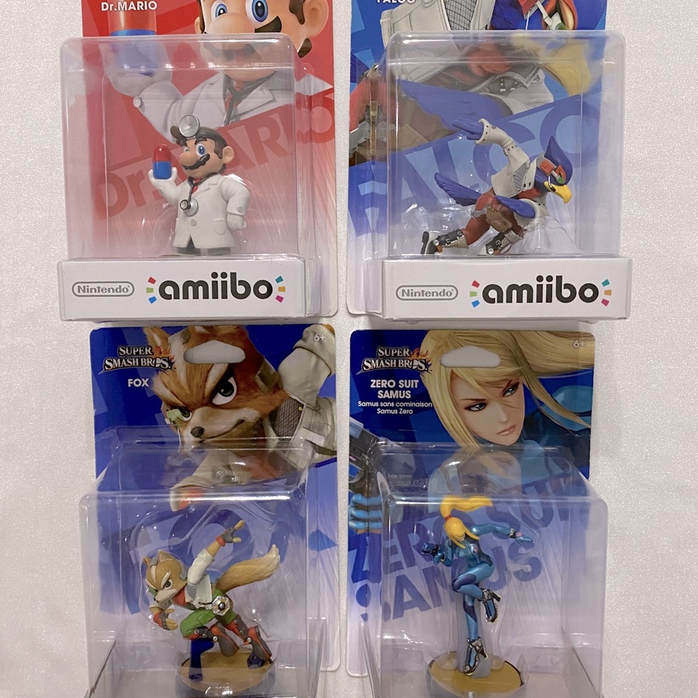 Nintendo Amiibo 4 pc Fox, Falco, Dr Mario, & Zero Suit Samus 2014/15 NOS Sealed